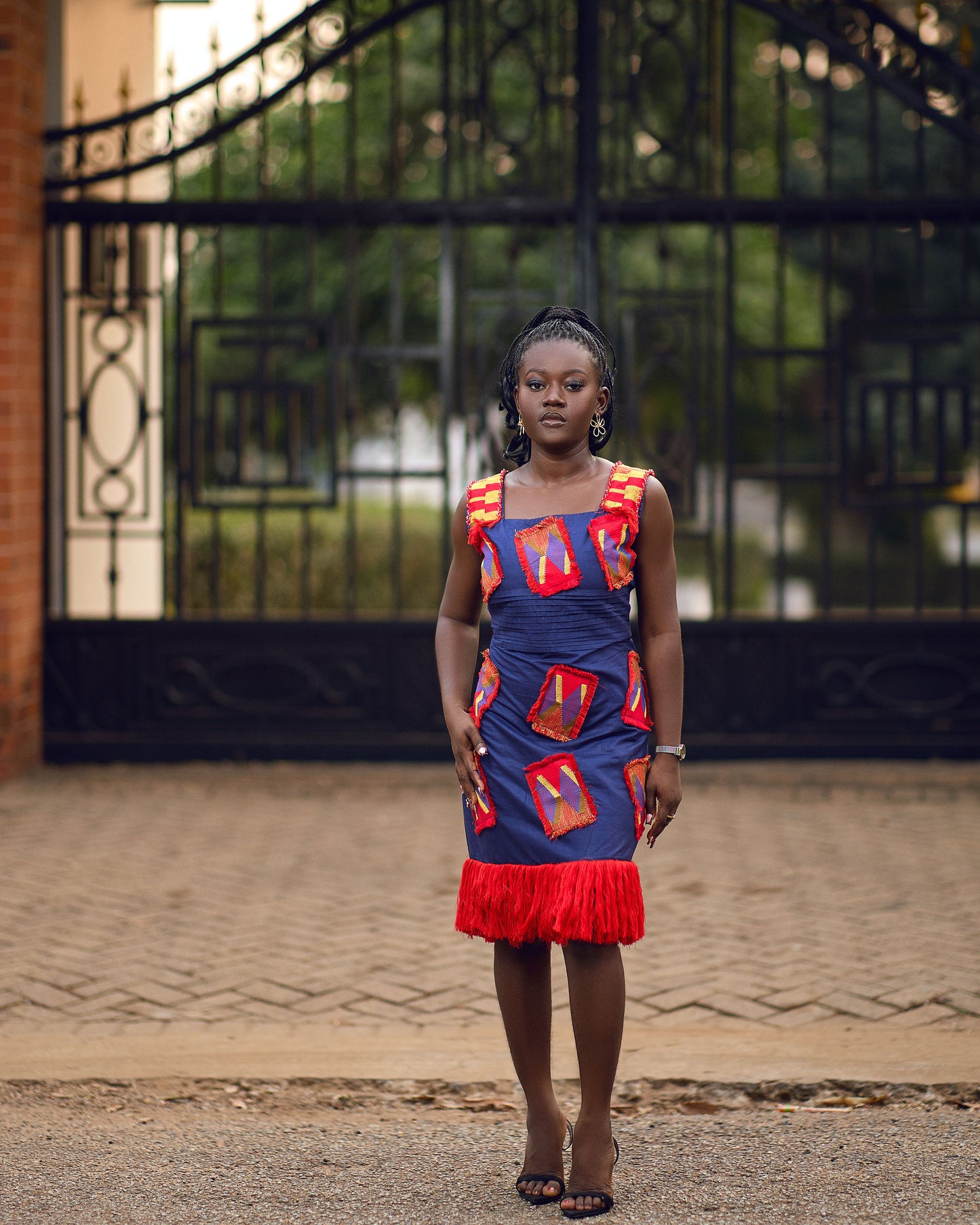 Young woman in kente dress