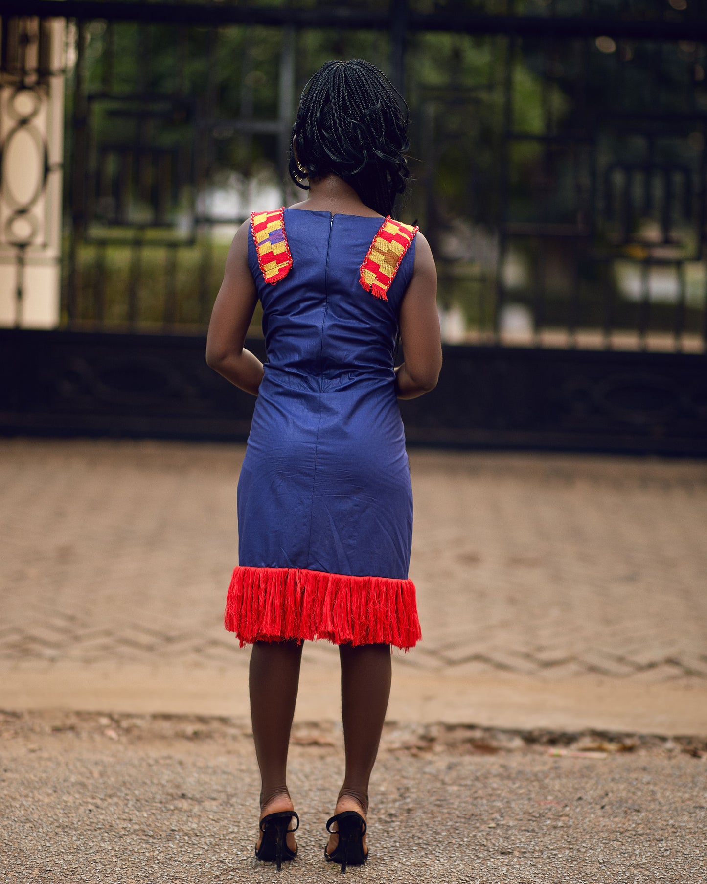 Young woman in kente dress