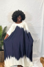 Black woman wearing bright colorful kaftan