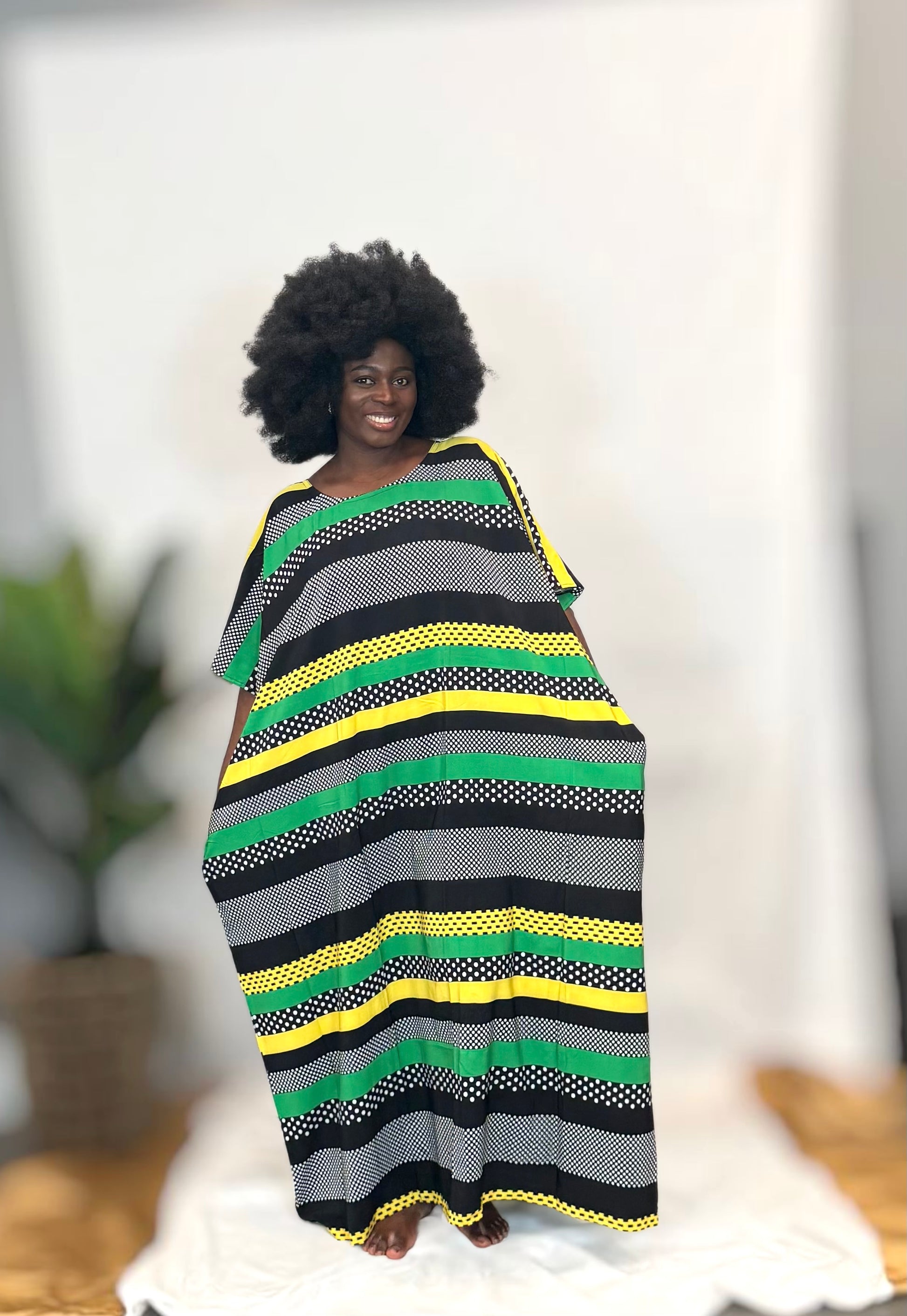 Black woman wearing colorful kaftan 