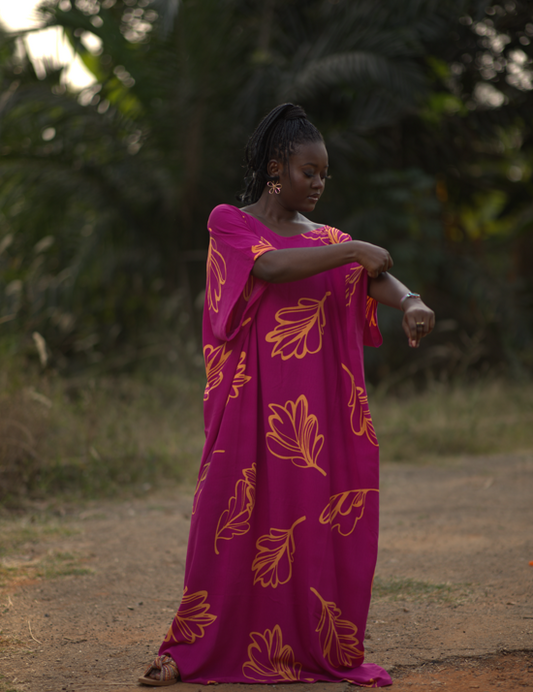 Woman wearing kaftan also known as bubu in african culture