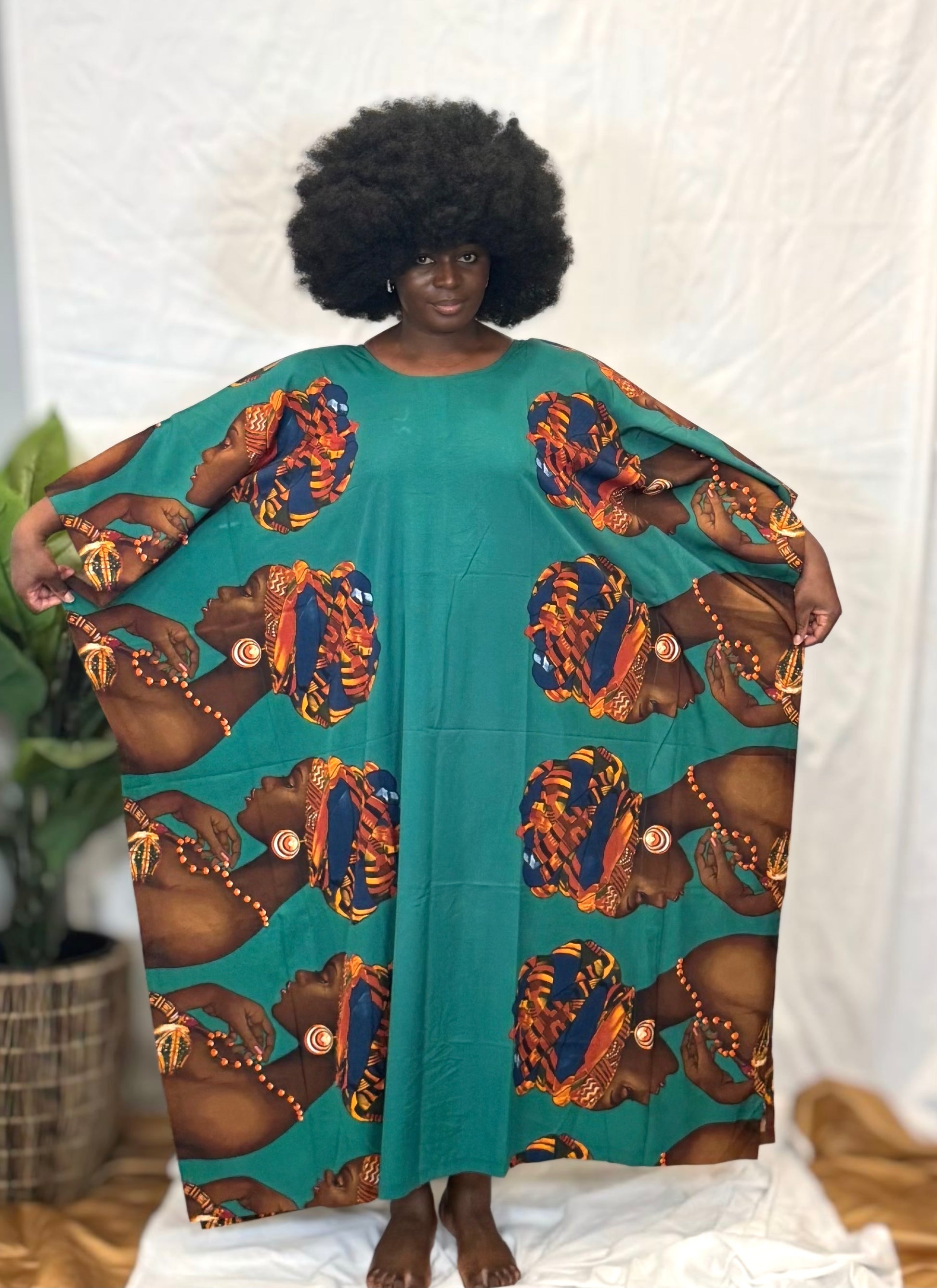 Black woman wearing bright colorful kaftan