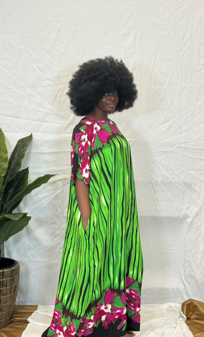Black woman wearing bright colorful kaftan