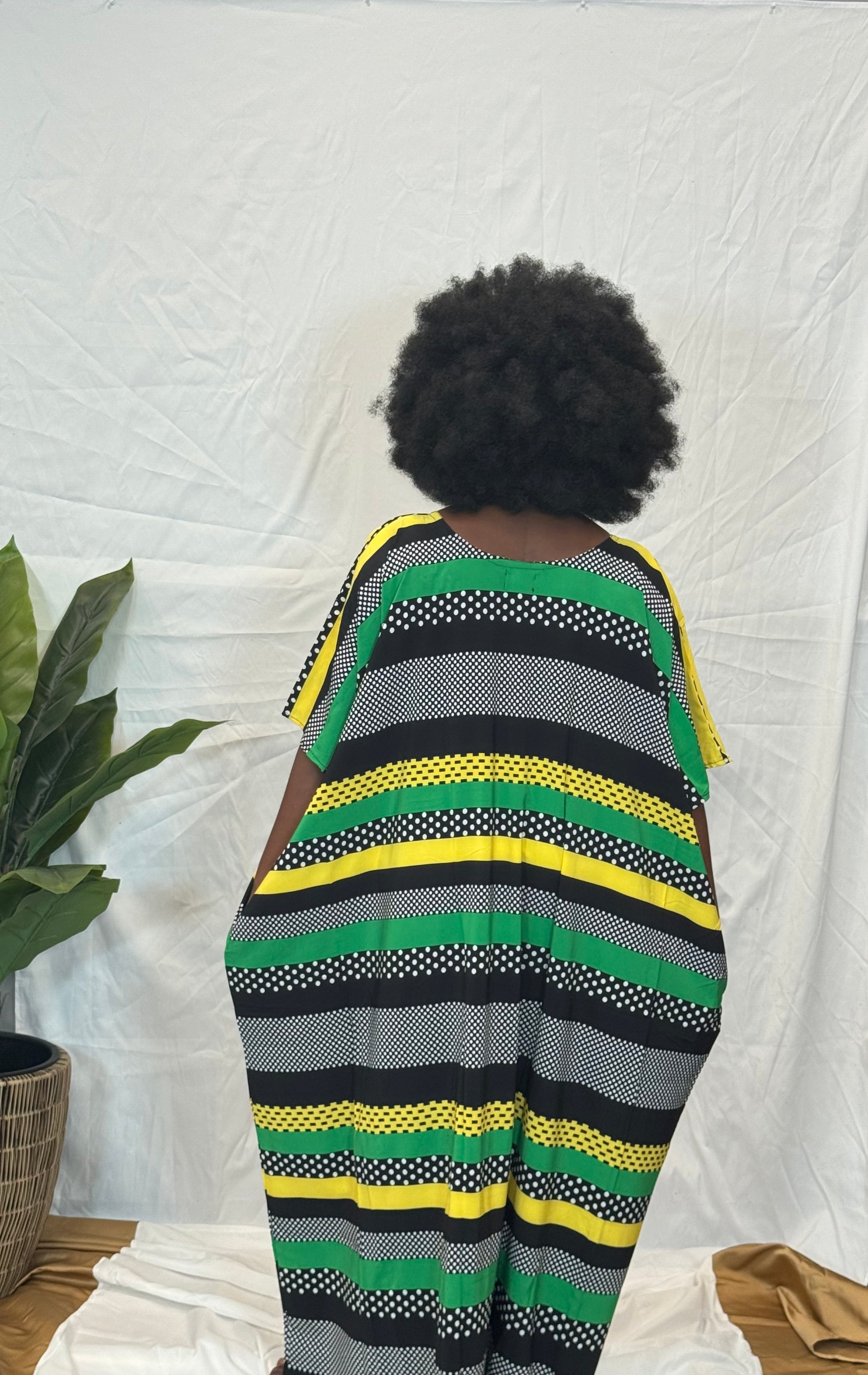 Black woman wearing colorful kaftan 