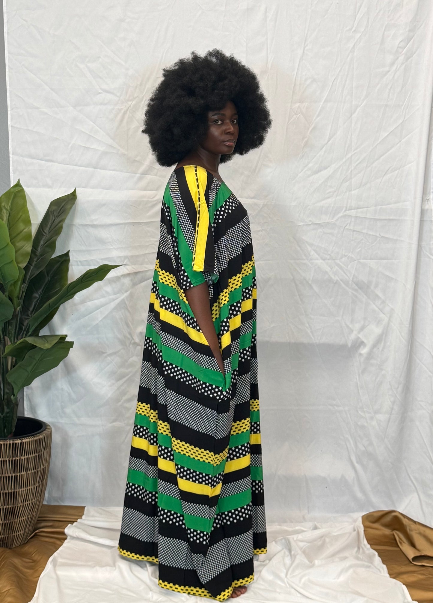 Black woman wearing colorful kaftan 