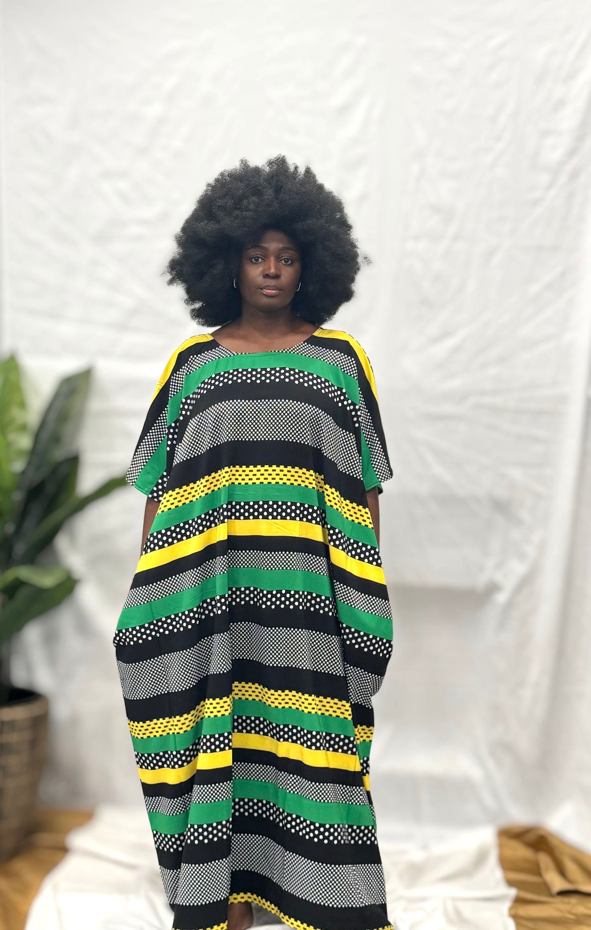 Black woman wearing colorful kaftan 