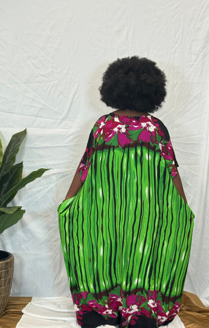 Black woman wearing bright colorful kaftan