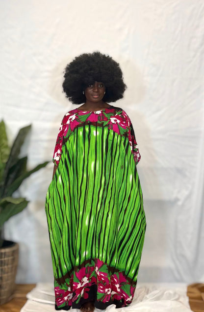 Black woman wearing bright colorful kaftan