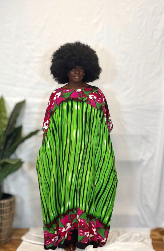 Black woman wearing bright colorful kaftan