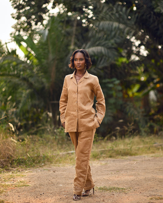 Young woman in linen shirt and pants set