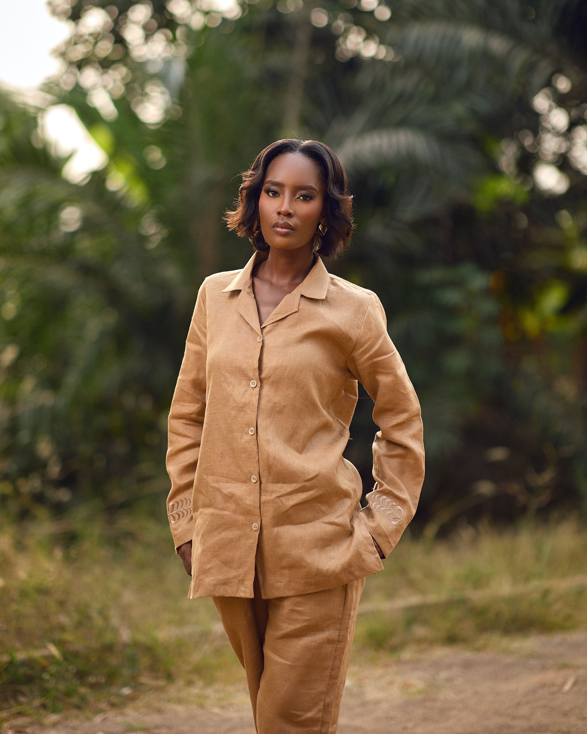 Young woman in linen shirt and pants set