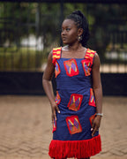 Young woman in kente dress