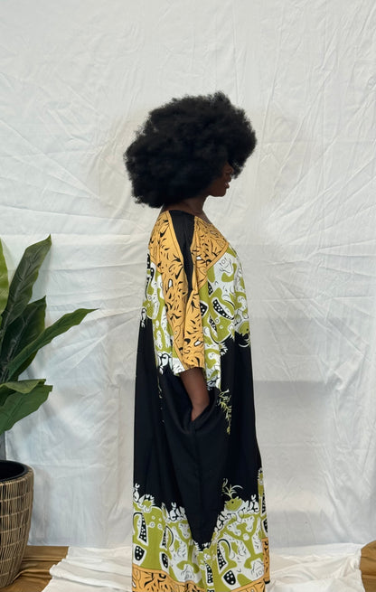 Black woman wearing colorful kaftan 
