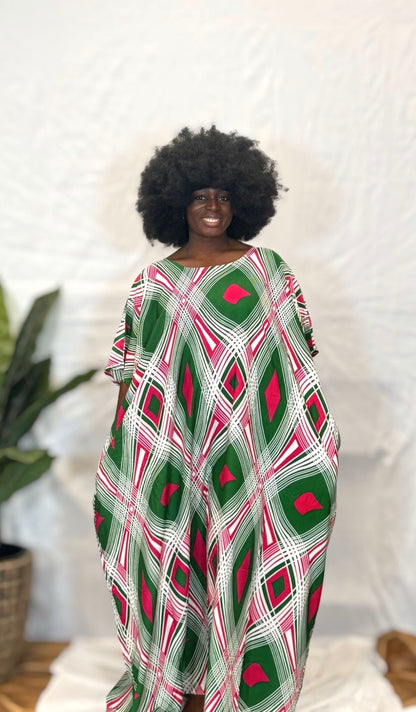 Black woman wearing bright colorful kaftan