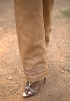 Young woman in linen shirt and pants set