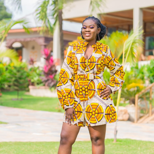 Young women in an african print summer jumpsuit